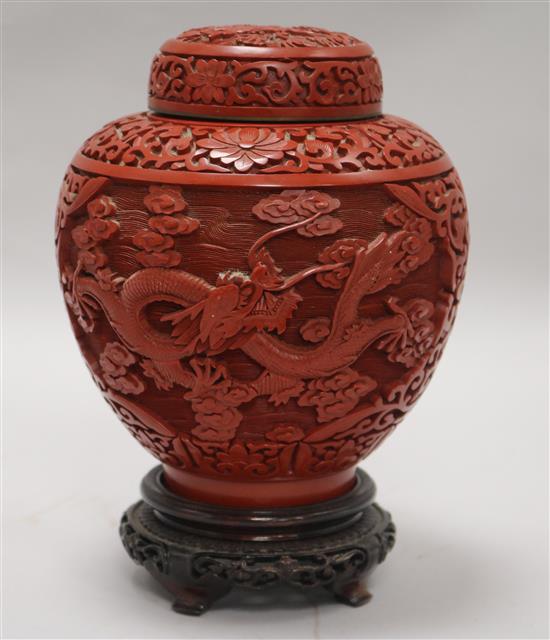 A Chinese cinnabar lacquer jar and cover